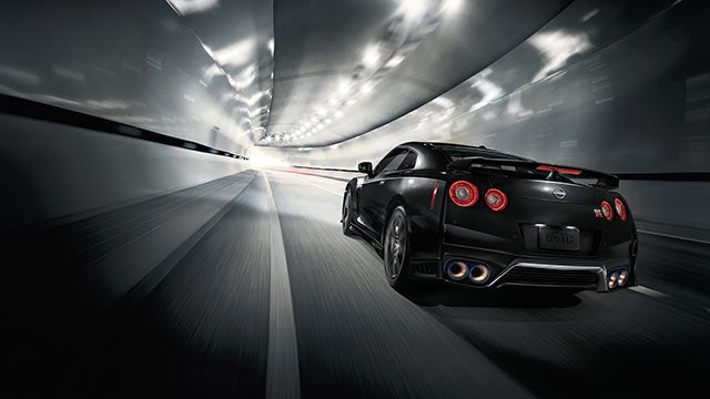 2023 Nissan GT-R seen from behind driving through a tunnel | Winners Circle Nissan in Hampton VA